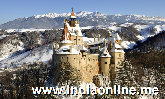 a castle on top of a snow covered mountain: Dracula country: visit Bran Castle. Photograph: Getty Images