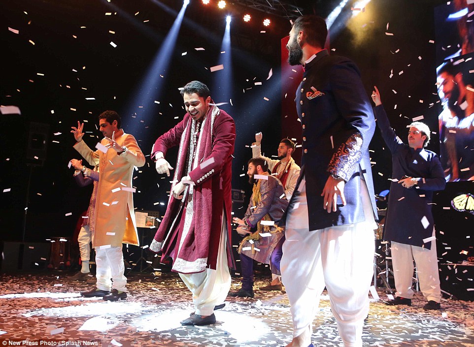 The groom, Rohan Mehta, centre, showed off his dancing prowess taking to the stage during an energetic number�