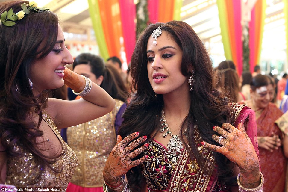 The bride Roshni mingles with friends at her wedding in Florence. She was born and raised in London and works in fashion