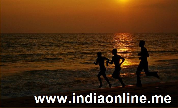 Running along the sea shore