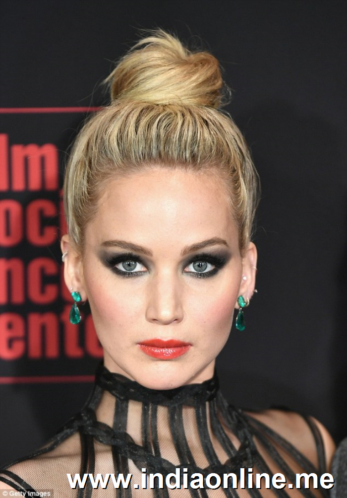 Drunk mistake! A photo of wide-eyed J.Law was projected on the screen which made the star cringe and run away from the audience